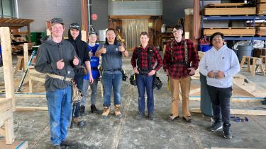 Skills Canada Carpentry Competition 7 male students part of the skills competition pose for photo