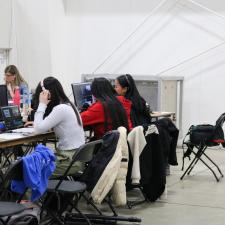 Female students sitting at computers as part of the BC Skills Competition